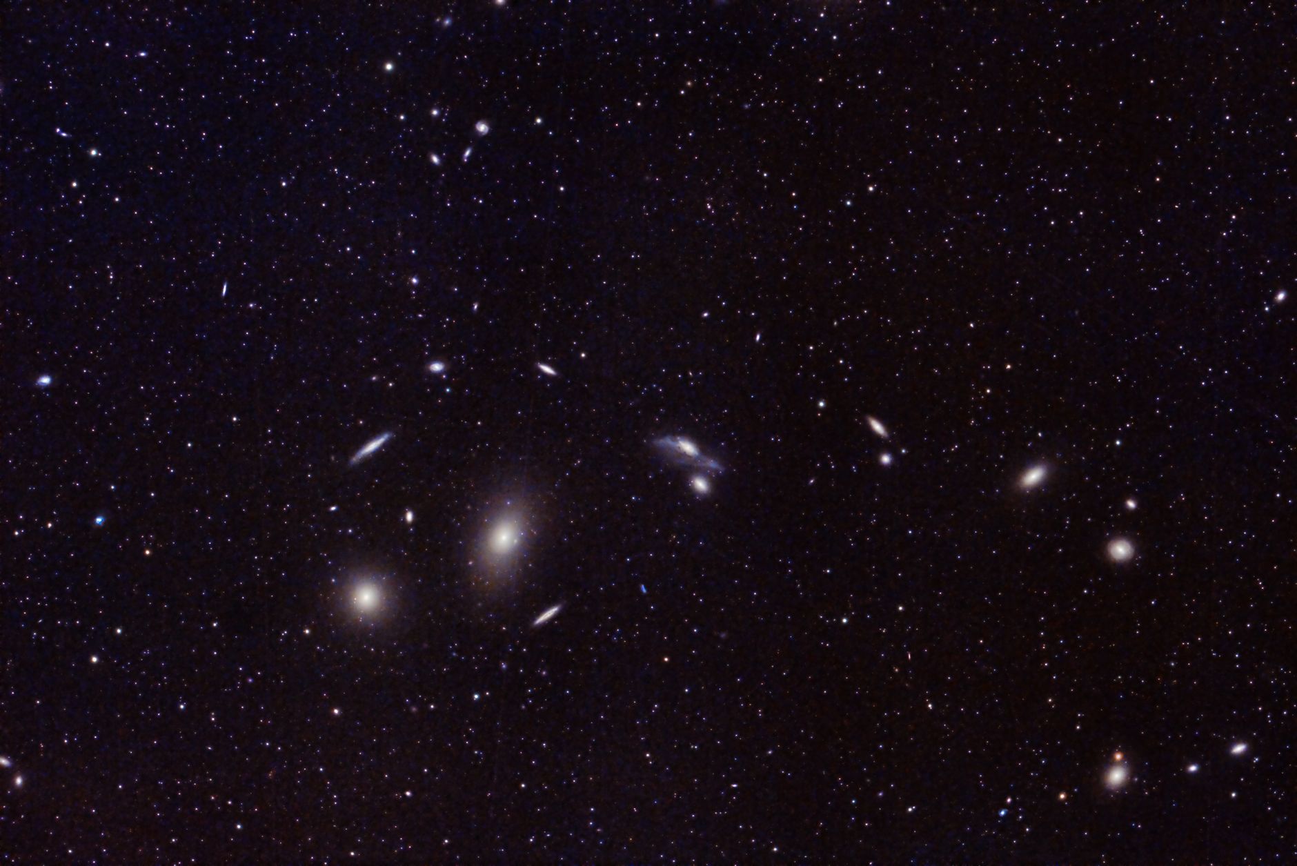 Hubble's Celestial Ballet: A Galaxy Swarm Unveiled
